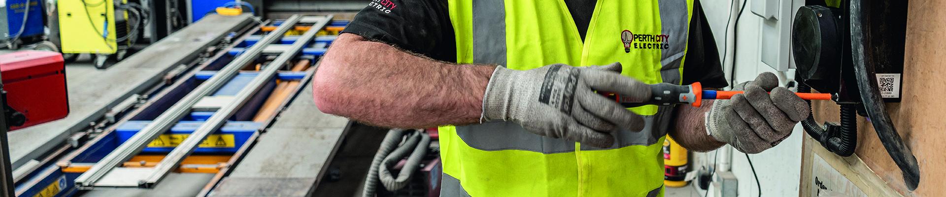 Man screwing with high vis